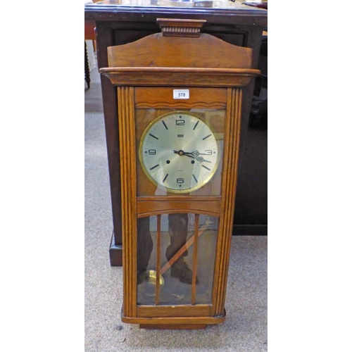 578 - BHS OAK CASED WALL CLOCK