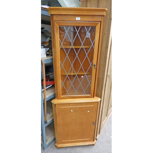 579 - WALNUT CORNER CABINET WITH GLASS PANEL DOOR OVER PANEL DOOR, HEIGHT 179CM