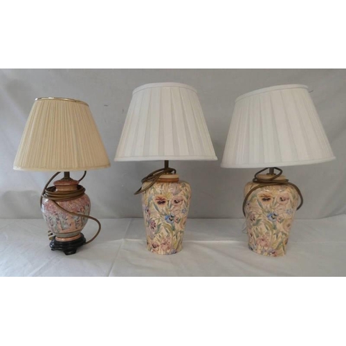 3070 - A PAIR OF PORCELAIN LAMPS 48CM TALL, FLORAL DESIGN WITH SHADES, ALSO 1 SMALLER LAMP WITH FLORAL DESI... 