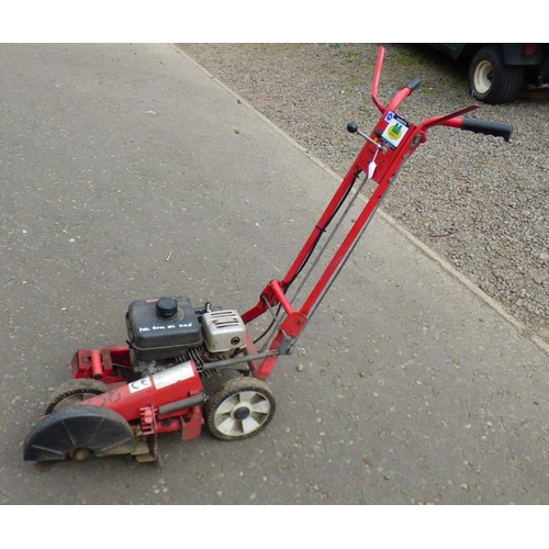 6132 - BUSHRANGER EDGER 4 STROKE LAWN EDGING MACHINE (FUEL BOWL HAS HOLE)