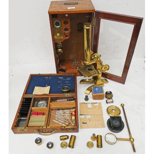 1000 - MILLIKIN & LAWLEY GILT METAL MICROSCOPE IN A FITTED AND GLAZED MAHOGANY CASE WITH SEVERAL ACCESSORIE... 