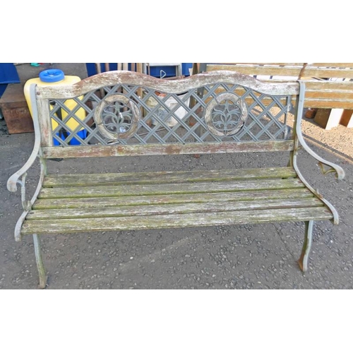 6059 - GARDEN BENCH WITH WROUGHT METAL ENDS AND DECORATION TO BACK