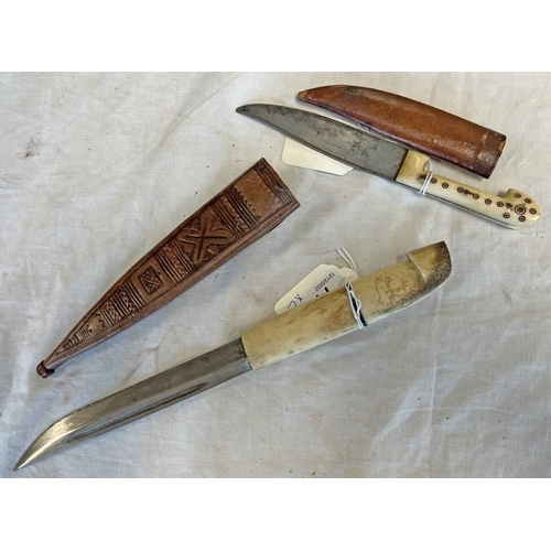 1477 - TWO CRETAIN / BALKAN KNIVES WITH BONE GRIPS AND LEATHER SCABBARDS