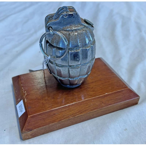 1574 - CHROME INERT HAND GRENADE ON WOODEN STAND