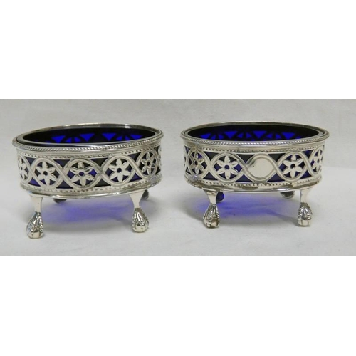 201 - PAIR OF GEORGE III SILVER OVAL SALTS WITH PIERCED SIDES, BALL & CLAW FEET & BLUE GLASS LINERS BY ROB... 