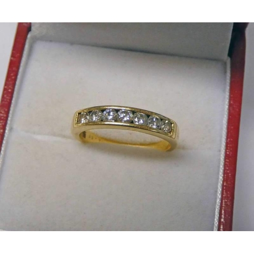 298 - 18CT GOLD DIAMOND SET 7 - STONE RING, APPROX 0.50 CARATS IN TOTAL