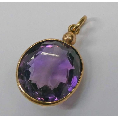 341 - 19TH CENTURY YELLOW METAL MOUNTED OVAL AMETHYST PENDANT - 3CM LONG, 4.8G