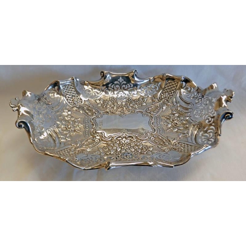 361 - EDWARDIAN SILVER OBLONG PEDESTAL DISH WITH PIERCED & FLORAL EMBOSSED DECORATION, RETAILED BY REID & ... 