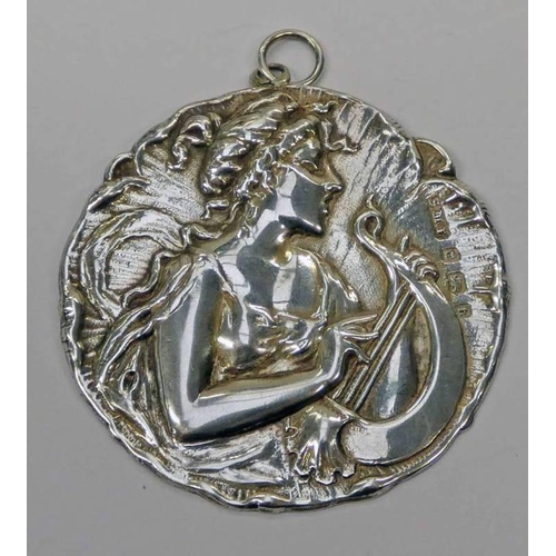 379 - ART NOUVEAU SILVER CIRCULAR PENDANT DECORATED WITH STYLISED MUSICIAN BY SAMUEL LEVI BIRMINGHAM 1901 ... 