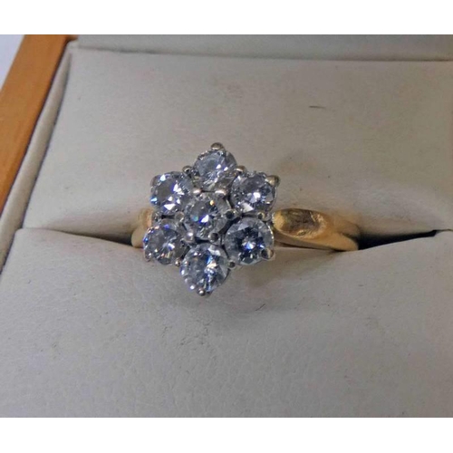 384 - 18CT GOLD DIAMOND CLUSTER RING, THE 7 BRILLIANT-CUT DIAMONDS APPROX. 0.98 CARATS IN TOTAL