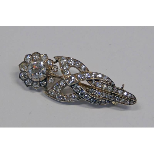 443 - LATE 19TH CENTURY OR EARLY 20TH CENTURY DIAMOND SET FLORAL BROOCH, THE PRINCIPAL DIAMOND APPROX 1.2 ... 