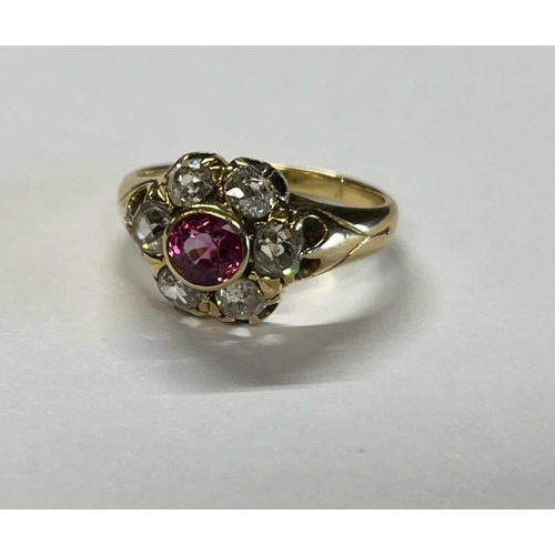 511 - 19TH CENTURY RUBY & DIAMOND CLUSTER RING, THE CUSHION SHAPED RUBY SET WITHIN A SURROUND OF 6 CUSHION... 