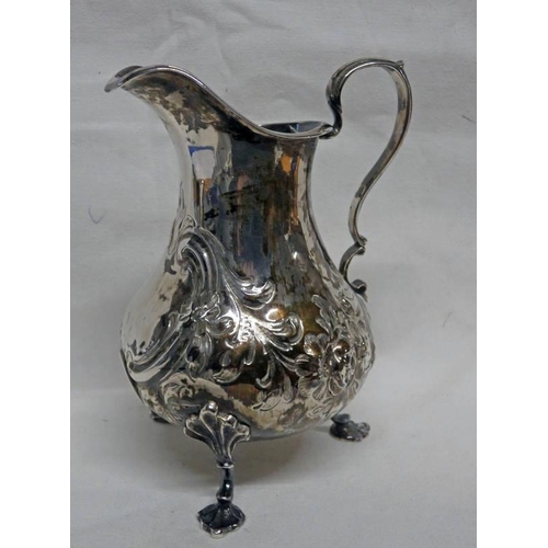 517 - VICTORIAN SILVER FLORAL EMBOSSED MILK JUG, LONDON 1873 - 160 G