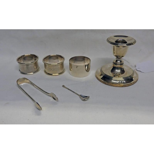 525 - 3 SILVER NAPKIN RINGS, PAIR SILVER SUGAR TONGS, SILVER DWARF CANDLESTICK ETC - 85 G WEIGHABLE SILVER