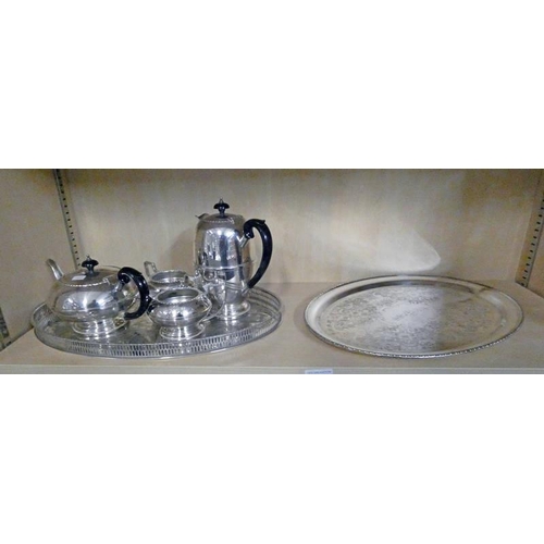 561 - SILVER PLATED 4 PIECE TEA SERVICE, GALLERIED TRAY AND ONE OTHER TRAY ON ONE SHELF