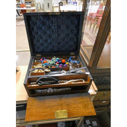 565 - 19TH CENTURY WALNUT LADIES JEWELLERY BOX AND CONTENTS OF WRISTWATCHES, BEAD NECKLACES ETC