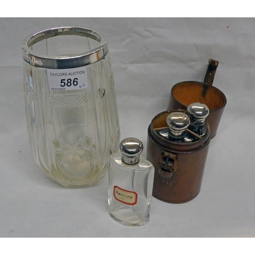 586 - SILVER MOUNTED GLASS VASE AND LEATHER CASED 3 - SECTION GLASS SPIRIT SET WITH SILVER PLATED MOUNTS