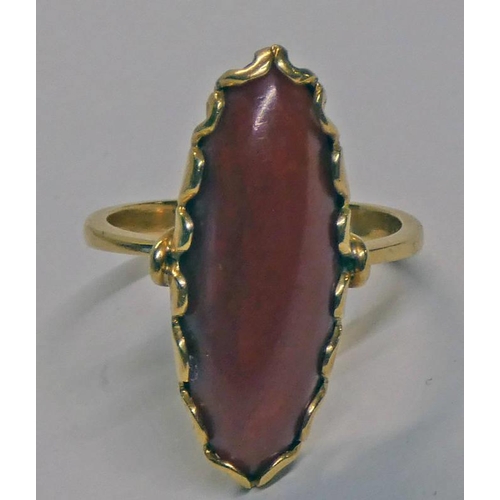 615 - 18CT GOLD DRESS RING SET WITH RED OBLONG CABOCHON STONE - 5.7 G