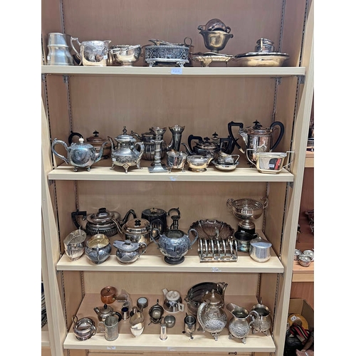 621A - LARGE SELECTION OF SILVER PLATED WARE INCLUDING CANDLESTICKS, TEASETS, ETC ON 4 SHELVES