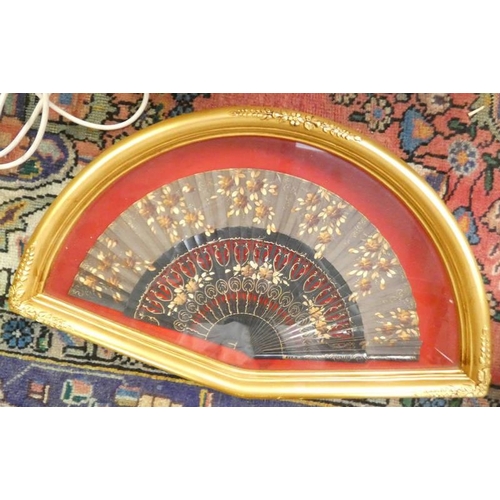101 - FAN WITH FLORAL DECORATION IN GILT CASE