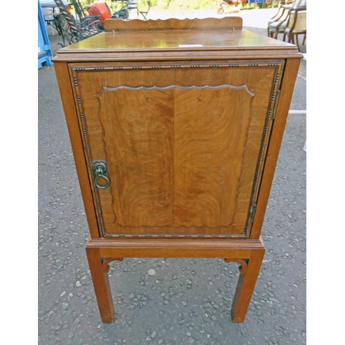 104 - EARLY 20TH CENTURY WALNUT BEDSIDE CABINET WITH PANEL DOOR ON SQUARE SUPPORTS 80 CM TALL