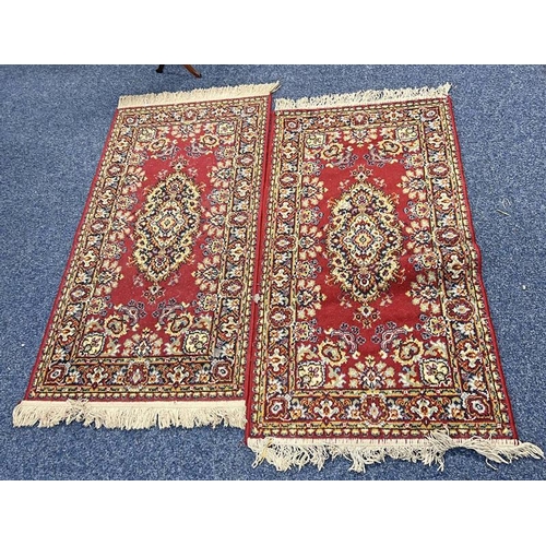 1562 - PAIR OF MIDDLE EASTERN STYLE RUGS, 66 X 130CM