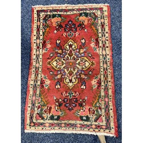 1572 - RED MIDDLE EASTERN STYLE RUG 80 X 50CM