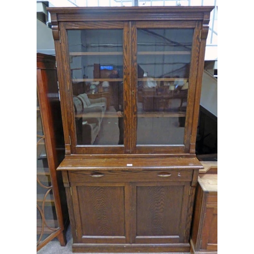 358 - LATE 19TH CENTURY OAK BOOKCASE WITH 2 GLAZED PANEL DOORS OVER BASE OF DRAWER OVER 2 PANEL DOORS