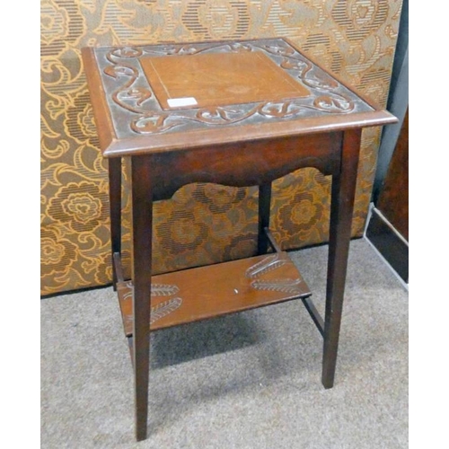 523 - MAHOGANY LAMP TABLE WITH DECORATIVE POKER WORK TOP ON SQUARE SUPPORTS