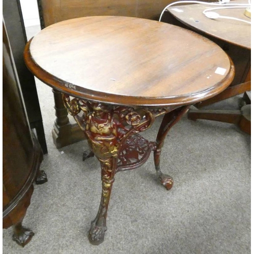 59 - MAHOGANY CIRCULAR TABLE ON PAINTED CAST METAL STAND WITH FIGURAL DECORATION, DIAMETER 60CM