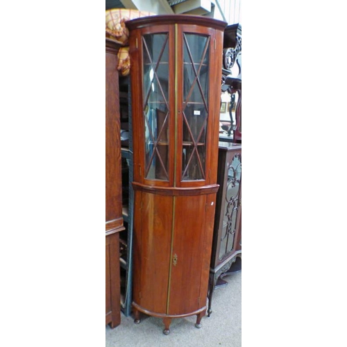 63 - 19TH CENTURY MAHOGANY BOW FRONT CORNER CABINET WITH 2 ASTRAGAL GLASS PANEL DOORS OVER 2 PANEL DOORS.... 