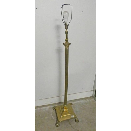 77 - EARLY 20TH CENTURY BRASS STANDARD LAMP WITH BALL & CLAW SUPPORTS, & DECORATIVE CORINTHIAN COLUMN
