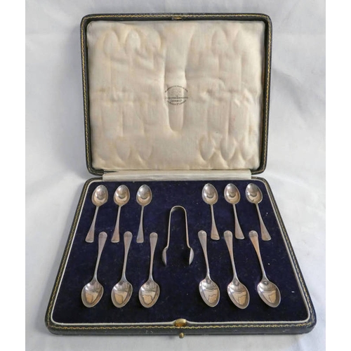 267 - CASED SET OF 12 SILVER TEASPOONS & SUGAR TONGS, SHEFFIELD 1921 IN A FITTED GOLDSMITHS & SILVERSMITHS... 