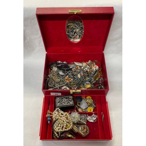 90 - RED LEATHER JEWELLERY BOX AND CONTENTS OF DECORATIVE JEWELLERY INCLUDING NECKLACES, EARRINGS, BROOCH... 