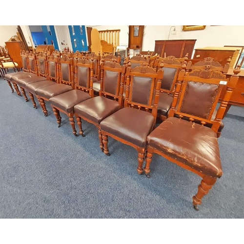 10 - SET OF 18 OAK DINING CHAIRS WITH LEATHER PADDED BACKS AND SEATS WITH CARVED CREST AND 1890 TO BACK (... 