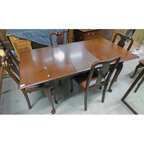 13 - EARLY 20TH CENTURY STYLE MAHOGANY DINING TABLE WITH 2 EXTRA LEAVES AND FOUR DINING CHAIRS  LENGTH 16... 