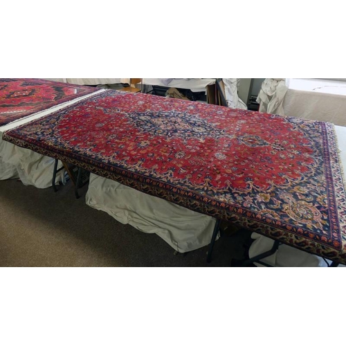 1419 - RICH RED GROUND PERSIAN KASHAN CARPET WITH FLORAL MEDALLION DESIGN, 283 X 182CM