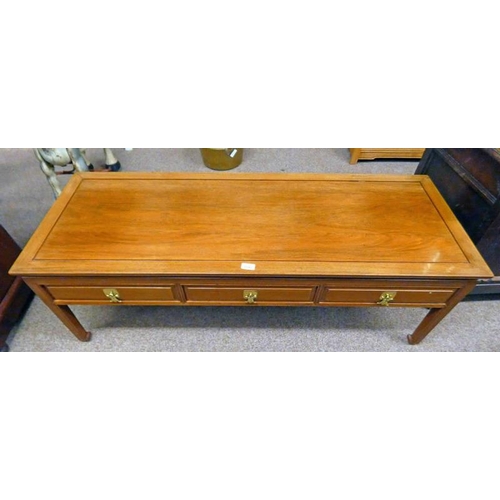 211 - ORIENTAL HARDWOOD TABLE WITH 3 DRAWERS ON SQUARE SUPPORTS. LENGTH 138 CM