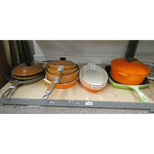 3102 - VARIOUS LE CREUSET WARE ON ONE SHELF