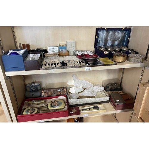 3416 - SELECTION OF VARIOUS ITEMS INCLUDING VANITY SETS, CASED CUTLERY, CAMERAS & OTHERS OVER 2 SHELVES