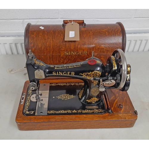 565 - OAK CASED SINGER SEWING MACHINE NO.F5201639