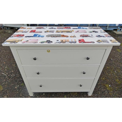 59 - CHEST OF 3 LONG DRAWERS ON SQUARE SUPPORTS WITH DECORATIVE WORK VEHICLES THEMED TOP  97 CM TALL X 11... 