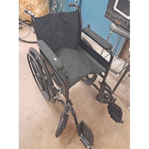 6038 - FOLDING WHEEL CHAIR