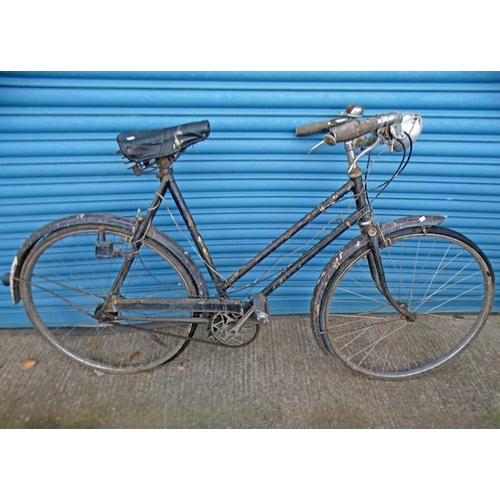 6007 - BICYCLE WITH SPRING SADDLE SEAT BY RALEIGH, NOTTINGHAM, ENGLAND