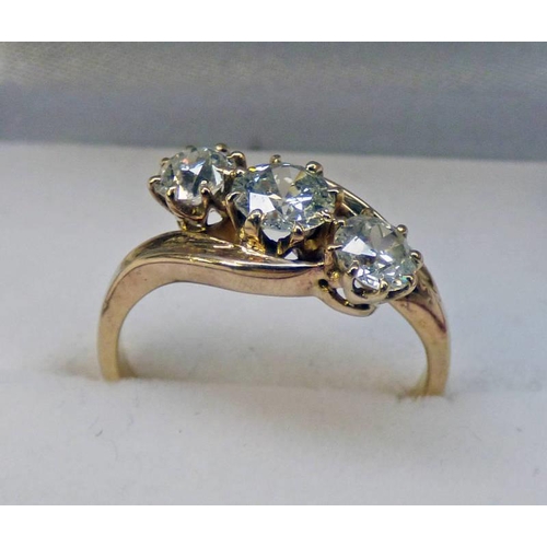 8 - 3 STONE BRILLIANT-CUT DIAMOND RING IN CROSSOVER SETTING, APPROX 1.05 CARATS IN TOTAL