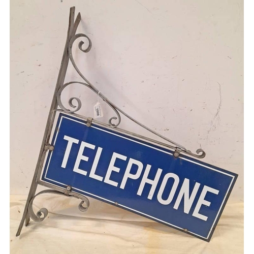 1009 - ENAMEL TELEPHONE SIGN ON METAL MOUNT, 72CM TALL