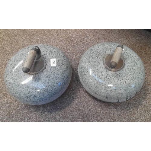 1041 - PAIR OF CURLING STONES WITH WOOD AND METAL HANDLES