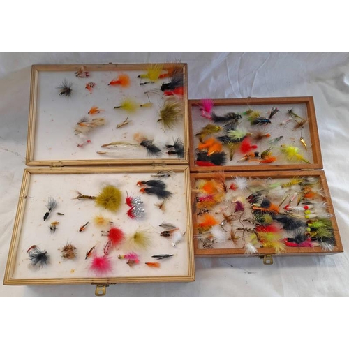 1049 - TWO MULTI SECTION FLY BOXES WITH A GOOD SELECTION OF FLYS