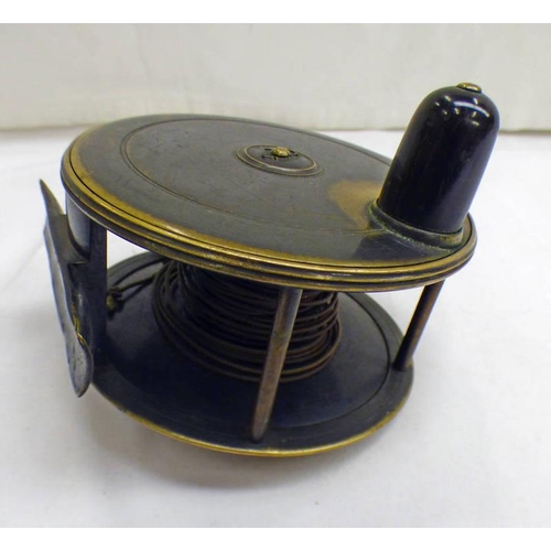 1051 - CHARLES FARLOW PATENT LEVER  4  1/2 INCH BRASS REEL NO 318,  191 STRAND ADDRESS WITH EBONY HANDLE