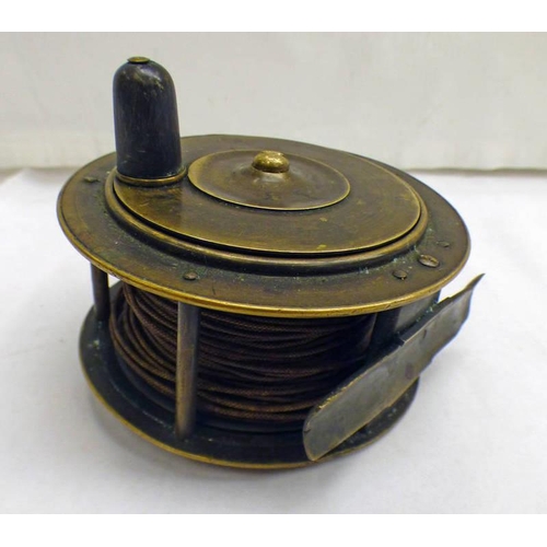 1066 - UNMARKED 4'' BRASS REEL WITH LINE